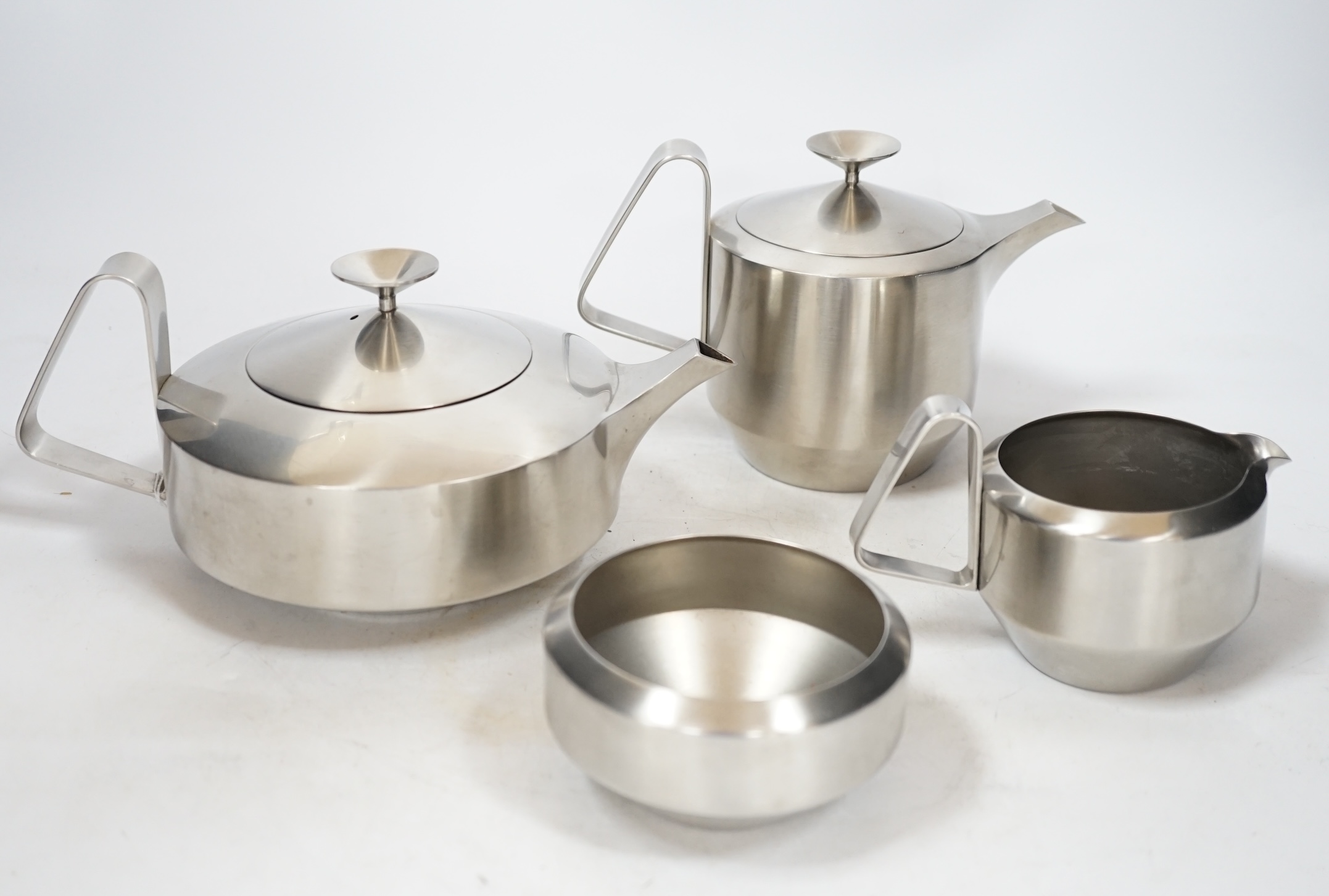 An Old Hall stainless steel four piece tea set, comprising of teapot, 11cm high, water pot, milk jug and sugar bowl